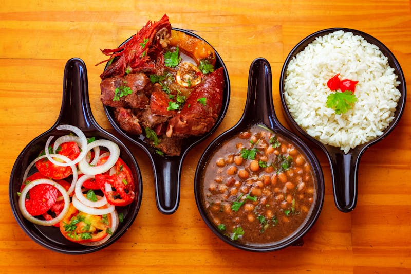 Carnitas power bowl with rice beans and toppings