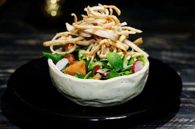 Classic taco salad in crispy tortilla bowl